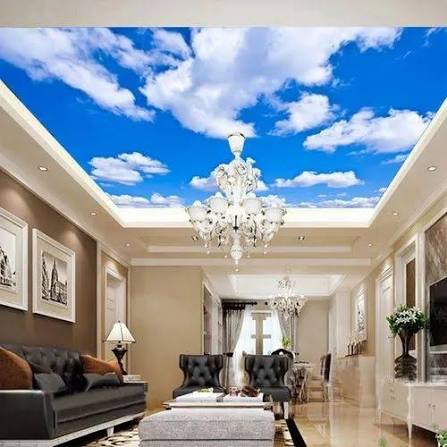 Bright blue sky and clouds printed stretch ceiling in Coral Gables living room with chandelier